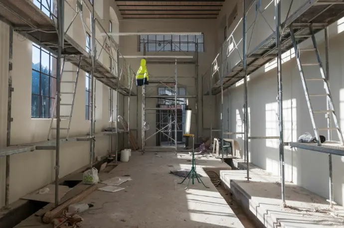 a room with scaffolding and scaffolding on the walls